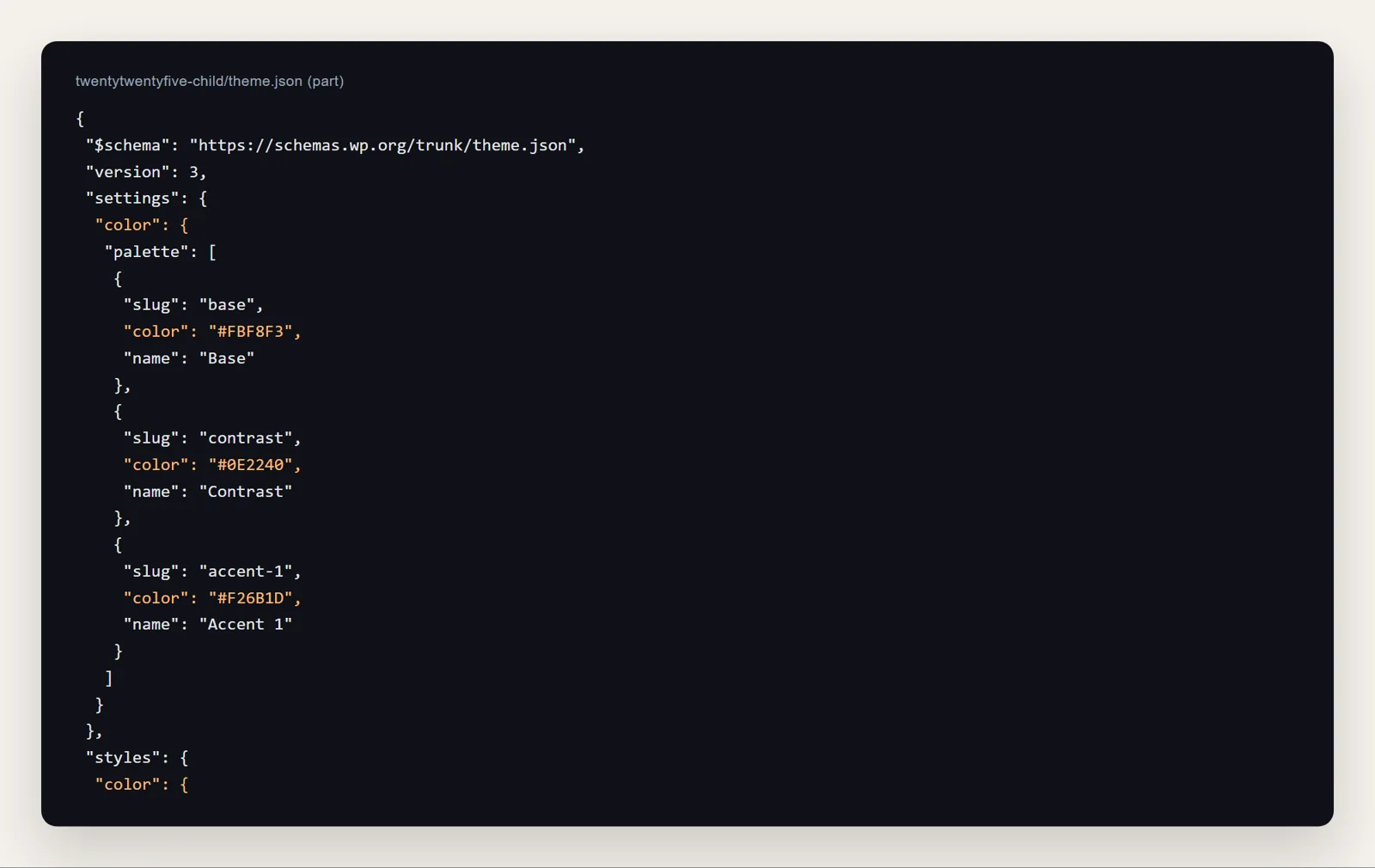 Part of a child theme theme.json setting a custom colour palette of cream, navy and orange